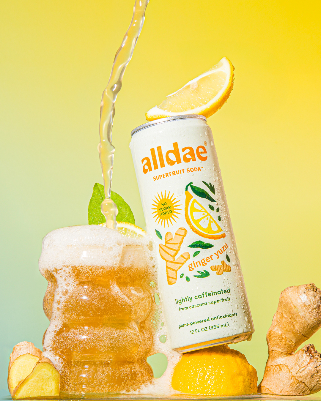 alldae superfruit soda Ginger Yuzu being poured into a glass. This is a healthy soda alternative with no added sugar or Stevia.